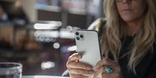 woman looking at a mobile phone